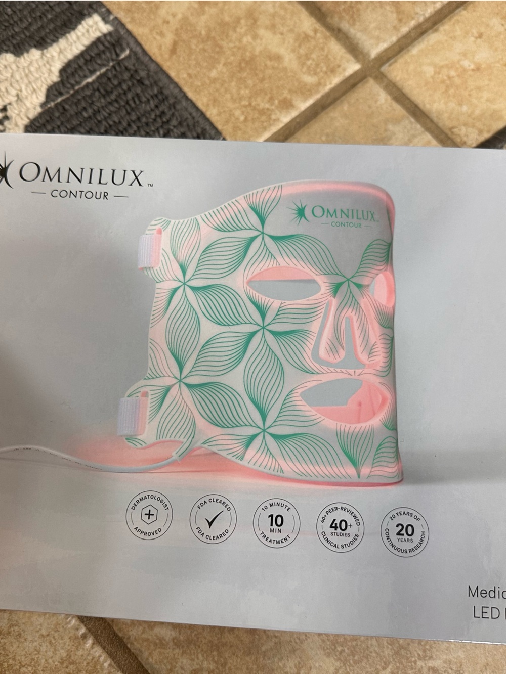 Omnilux Contour Women's LED Skincare Mask — Pink with Green Leaf Pattern